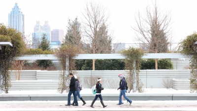 Students walk on the Fifth Street bridge during the January 2014 snow storm. Photo courtesy of GVU Center