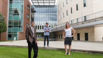 Georgia Tech is part of the Center for Sustainable Nanotechnology, a $20 million NSF research center focusing on the molecular mechanisms by which nanoparticles interact with biological systems. Among the participants are (l-r) Rigoberto Hernandez, Gene Chong and Caley Allen, shown here in front of the Molecular Science and Engineering Building. (Credit: Rob Felt, Georgia Tech)