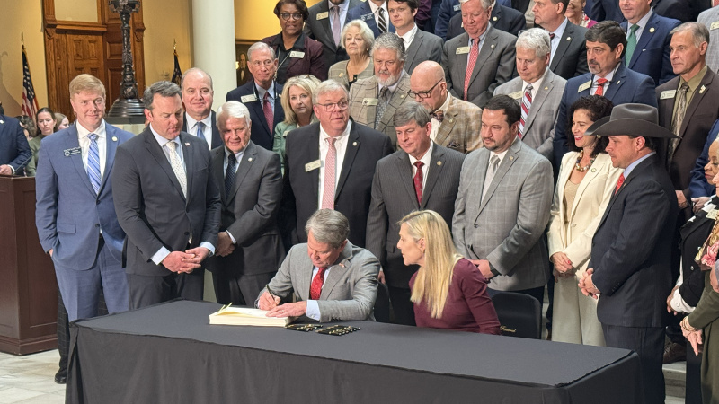 Gov. Brian Kemp signs the amended FY26 budget on March 3.