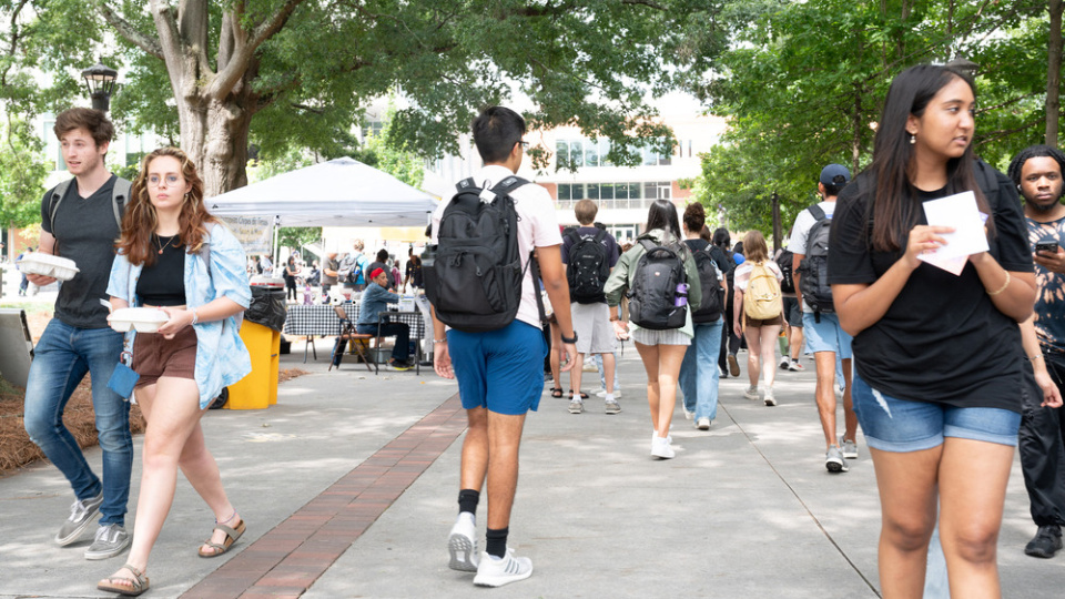 Students walk along Tech Walkway