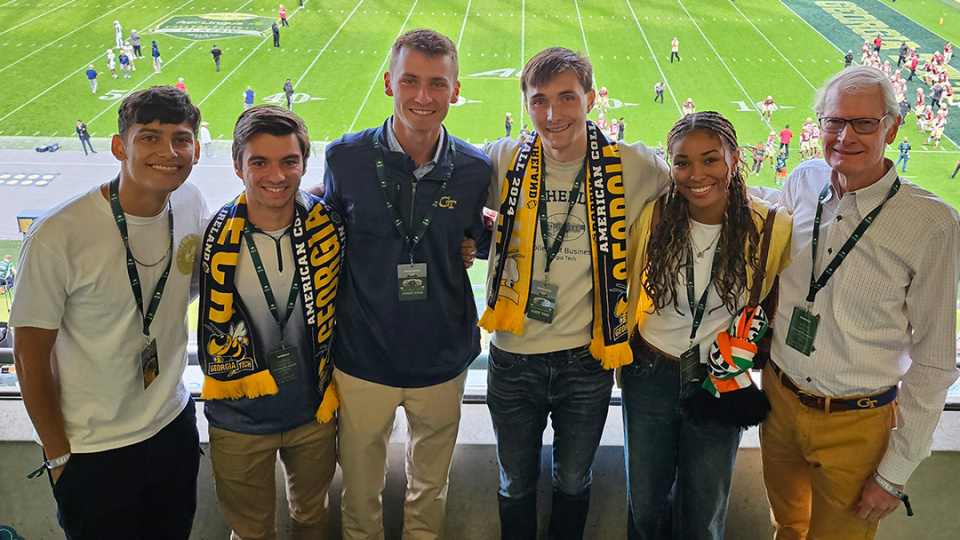 Dick Bergmark (right) and students