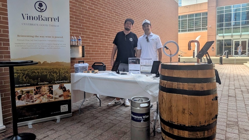 Alumni Christian Doetsch (left) and Seth Lytle brought their VinoBarrel demo to campus during the Tech Square Tech Hop in August.