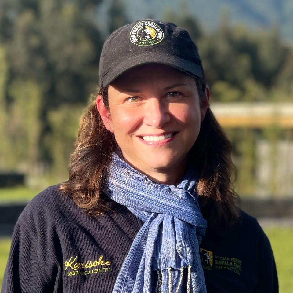 Headshot of a woman wearing a Dian Fossey gorilla fund ball cap